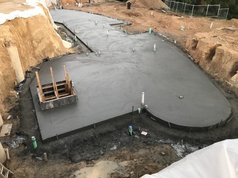 Fresh concrete slab poured on site