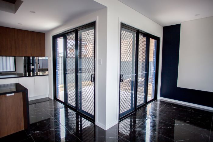 ABM Windows & Doors sliding doors in kitchen and living room