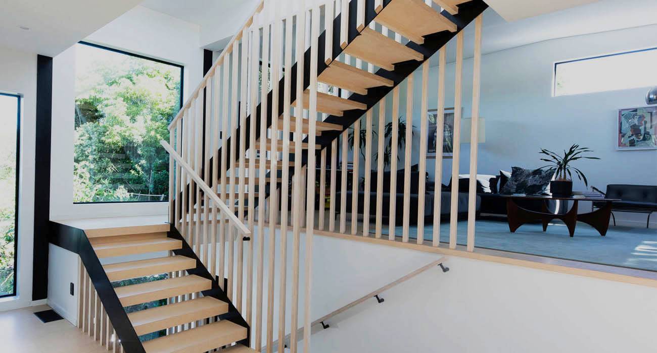 Best Stairs internal staircase timber with black trim and timber panelled balustrade