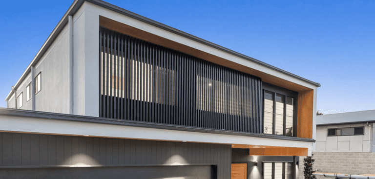 Luxe Metalworks privacy screens on modern two story house