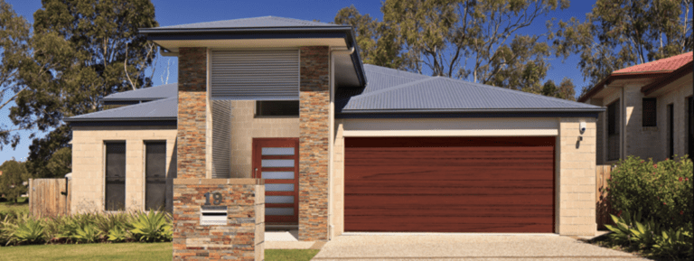Residential house with dark timber look garage door