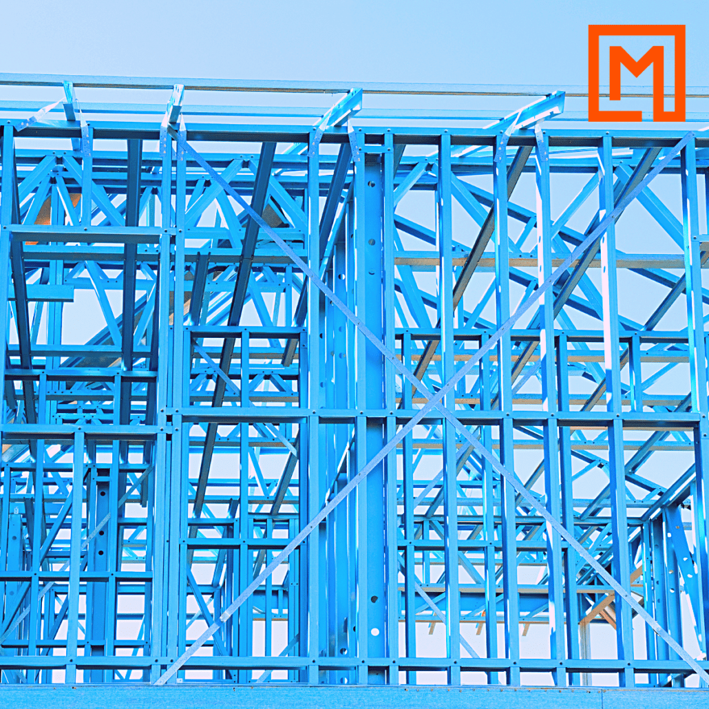 Metframe Australia blue steel frame and trusses against a blue sky. Logo in top right corner