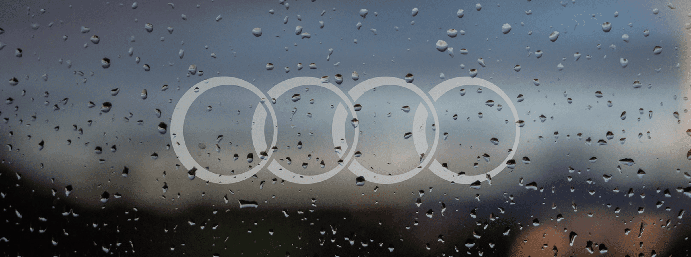 Window with rain droplets on it and the Dowell logo in the centre