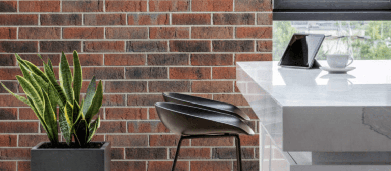Exterior outdoor setting against a red brick wall