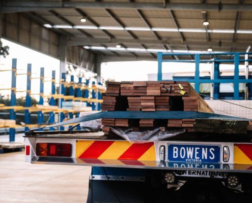 BOWENS CROYDON truck in warehouse with timber loaded and ready to be delivered