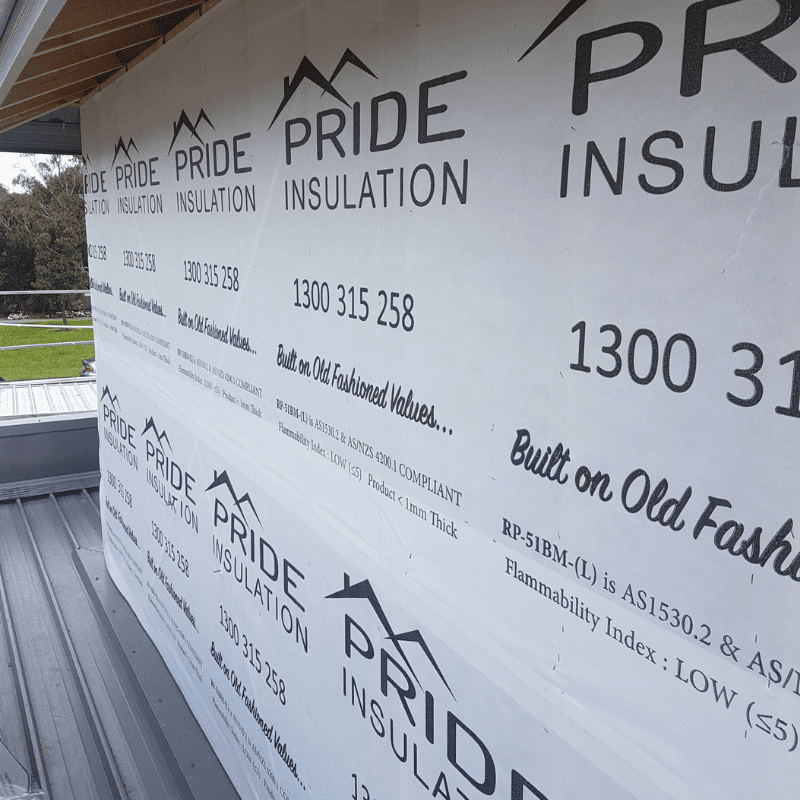 Pride Insulation white house wrap with black logo