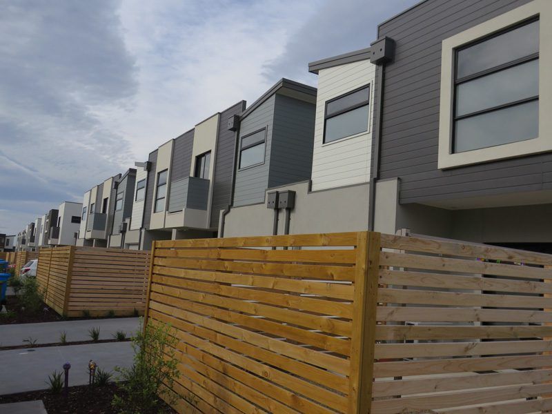 RN Cladding Townhouses white and grey horizontal planks