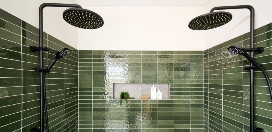 Radiant Tiles Green Subway shower tiles dual shower heads