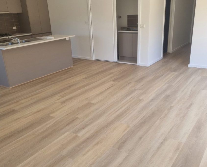 Pride Flooring light oak flooring on kitchen and hallway