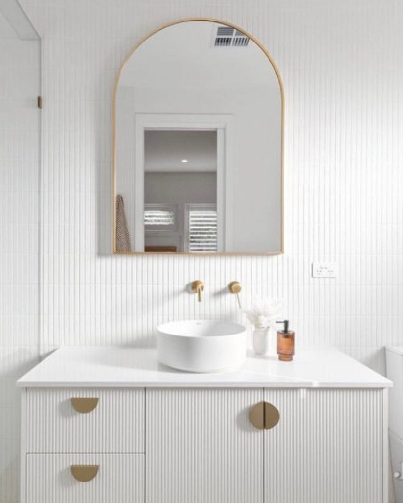 National Tiles neautral bathroom white with gold trims