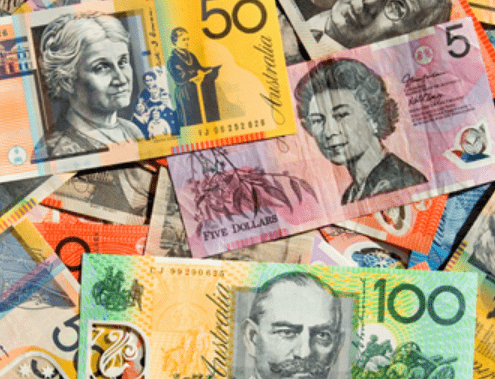 Colourful Australian money spread out in a messy pile