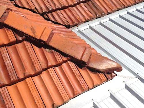 Raven Roofing metal meets tiles