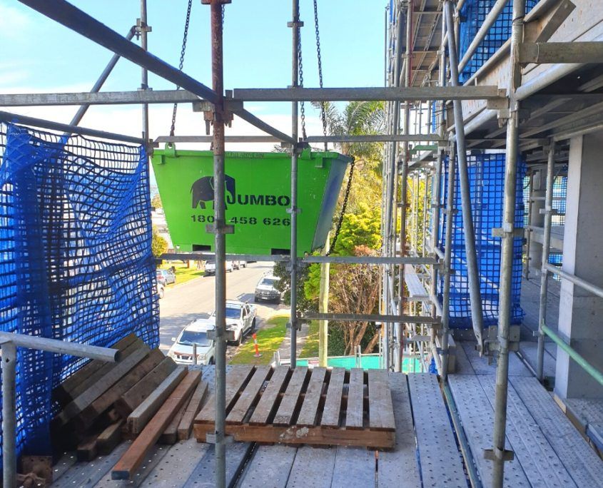 Jumbo skip bins crane second story