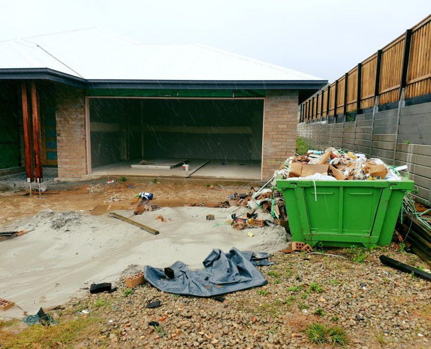Jumbo skip bins full bin on site