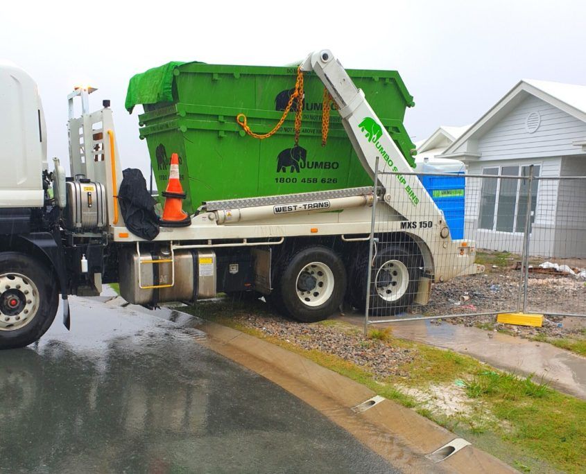 Jumbo skip bins truck delivery to site