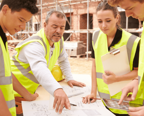 crew on site looking at plans