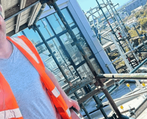 chad plaster owner on scaffolding