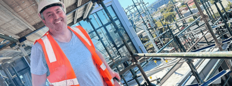 chad plaster owner on scaffolding