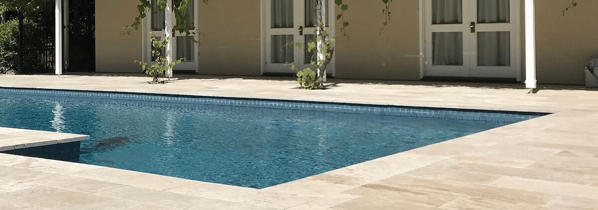 pool with stone centre pavers