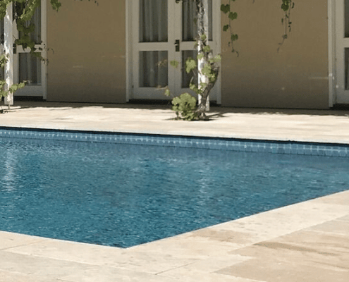pool with stone centre pavers