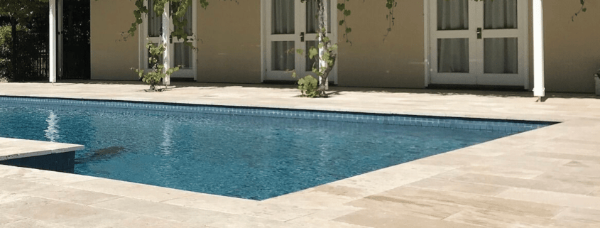 pool with stone centre pavers