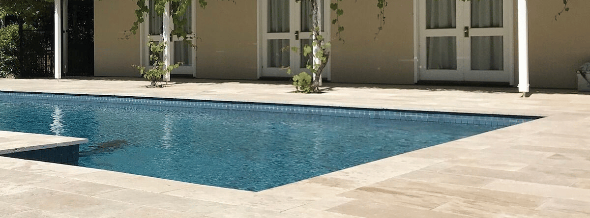 pool with stone centre pavers