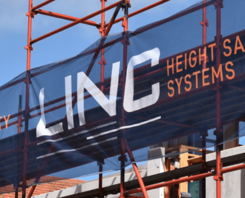 linc scaffolding banner on site