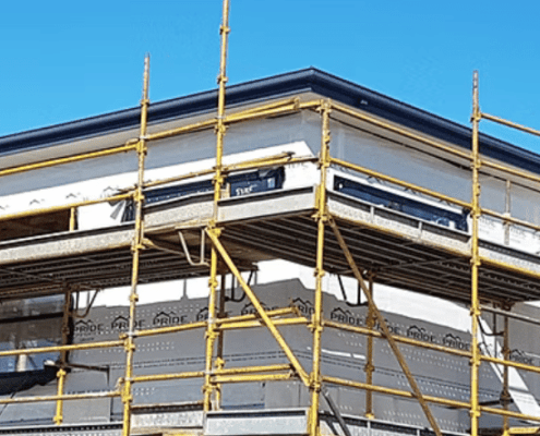 Newsletter Banner pride insulation white wrap with scaffolding