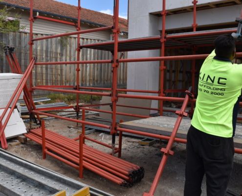 linc scaffolding employee building from the ground