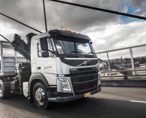 Newsletter Banner 2025 ausreo truck delivering reo over steel bridge